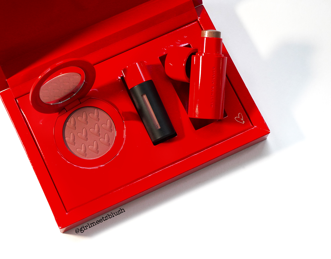 Westman Atelier Les Etoiles holiday 2023 set with powder blush, lip gloss, and highlighter stick